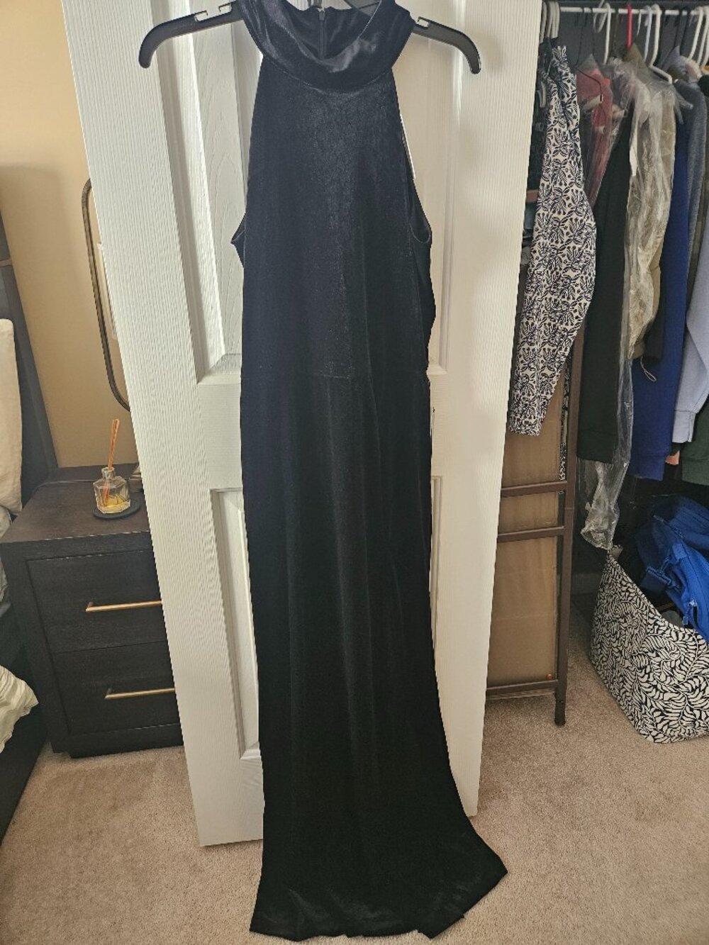 Skinny black velvet dress with slit
